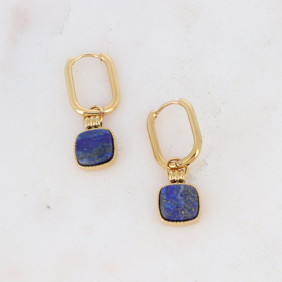 dark blue lapis lazuli square pendant on a small oval hoop gold earrings 